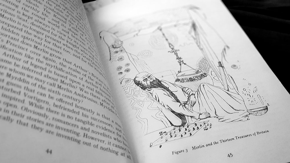 The Book of Merlin page spread with artwork by Miranda Gray